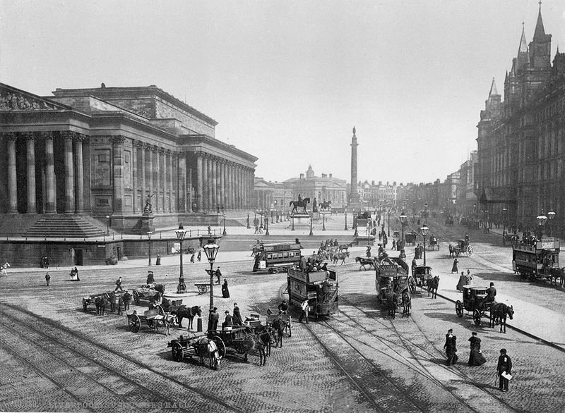 Lime Street, Liverpool in the 1890s, St.George's Hall to the left, Great North Western Hotel to the right, Walker Art Gallery and Sessions House in the background. Statues of Prince Albert, Disraeli, Queen Victoria and Wellington's Column in the middle ground.